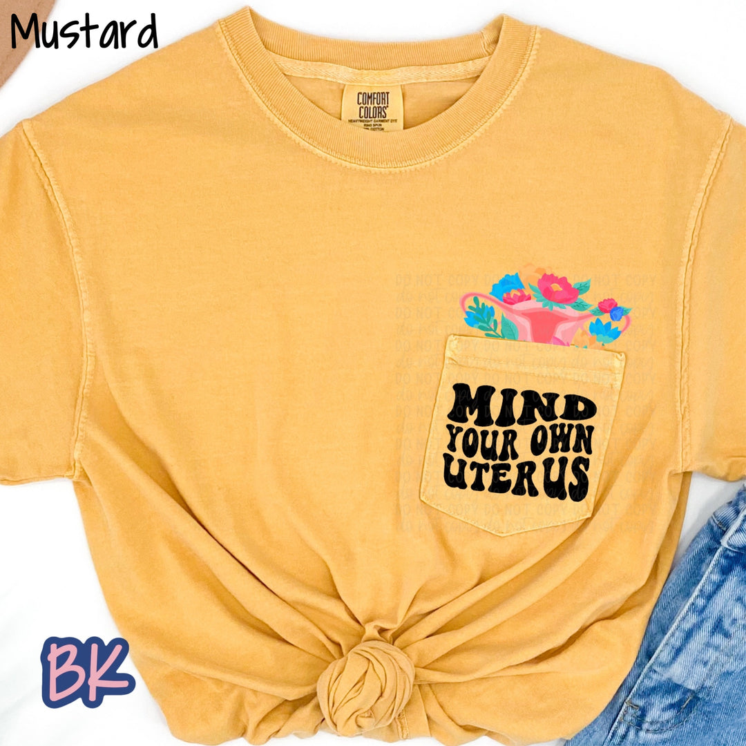 Mind Your Own Uterus Mustard Pocket Tee