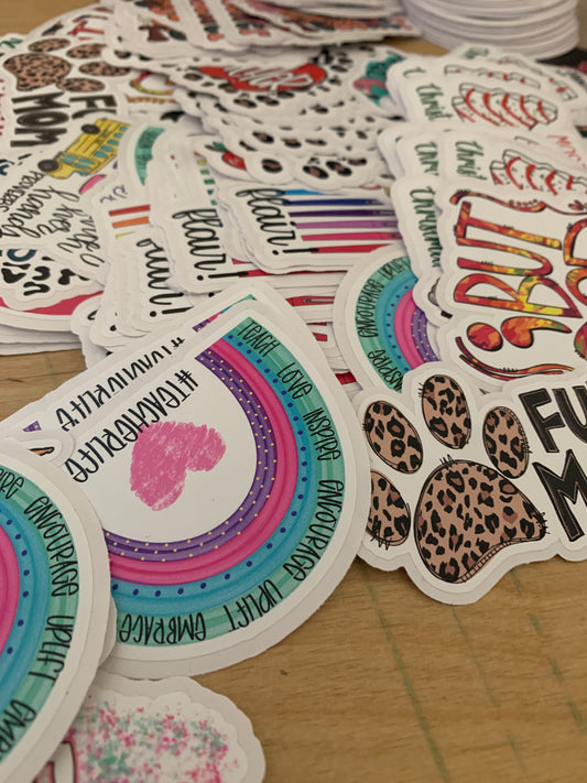 Mystery stickers (approx 3” die cut)